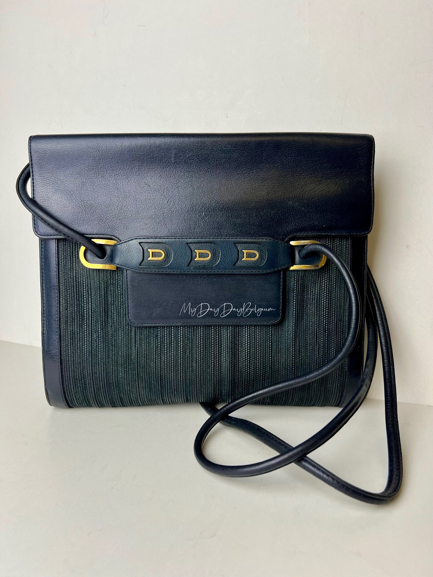 Delvaux toile de cuir
