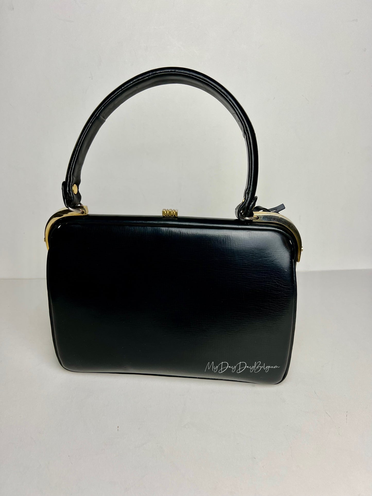 Delvaux Top handle 1956