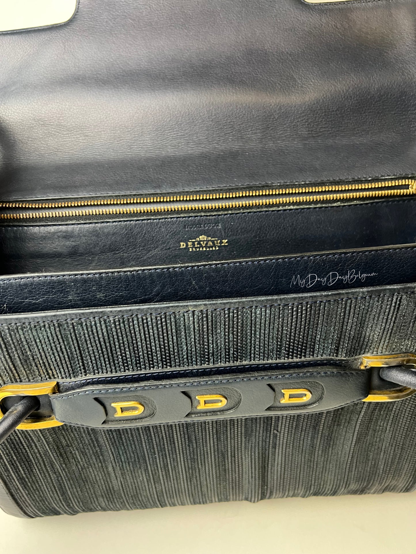 Delvaux toile de cuir
