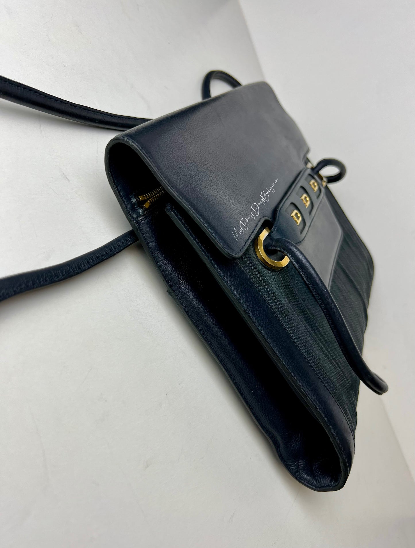 Delvaux toile de cuir