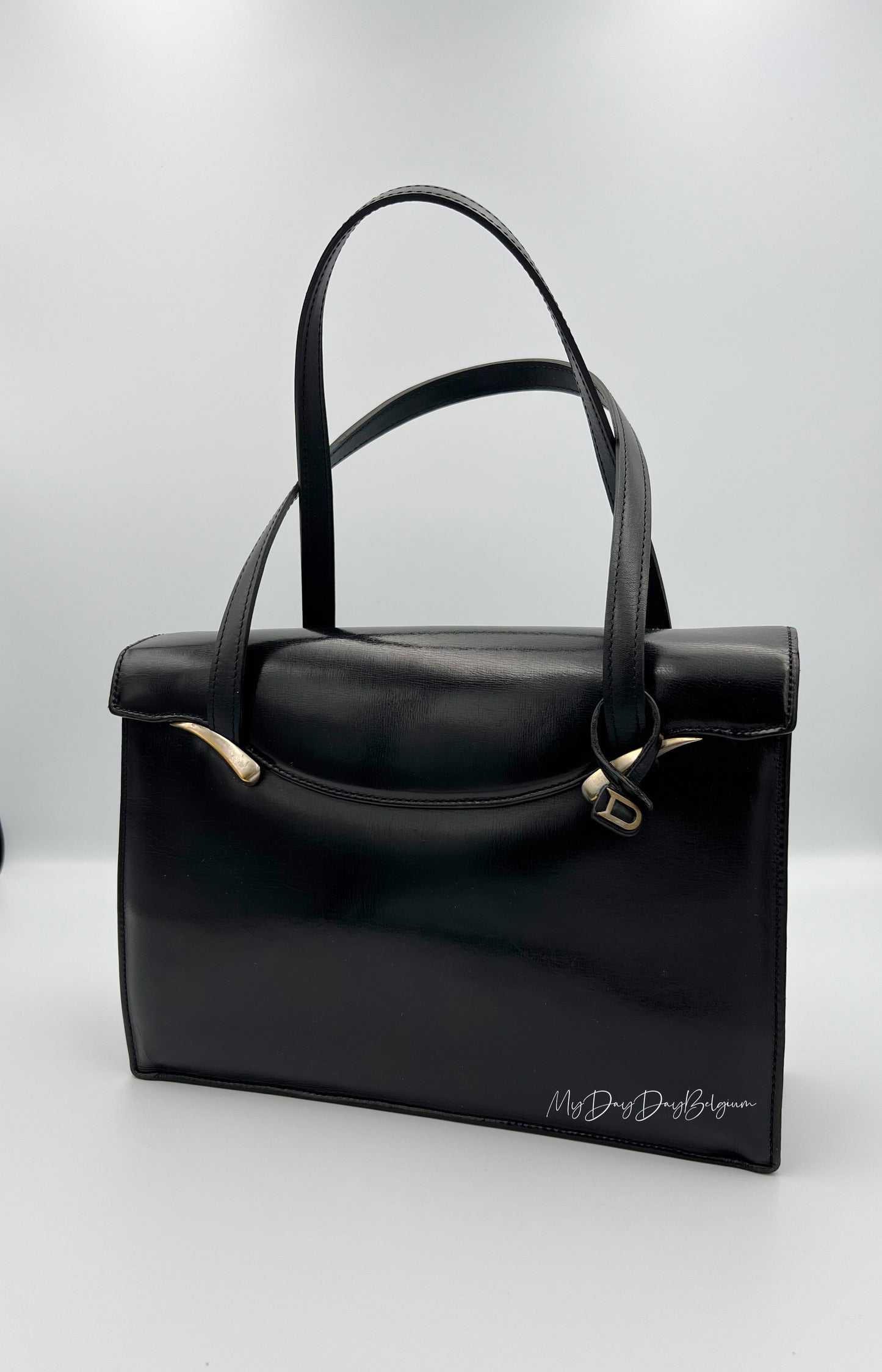 Delvaux vintage top handle 1957