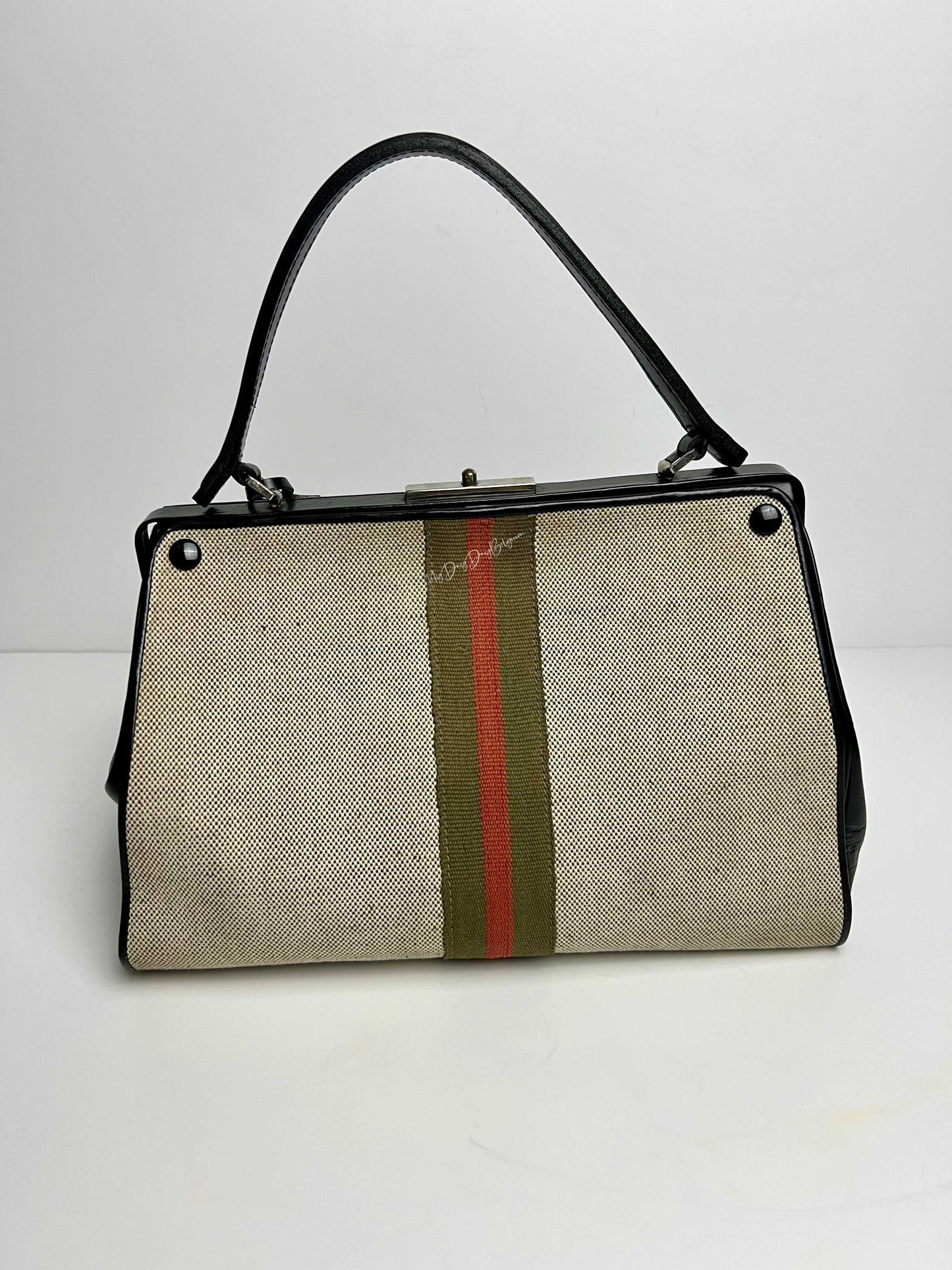 Delvaux vintage top handle 1961