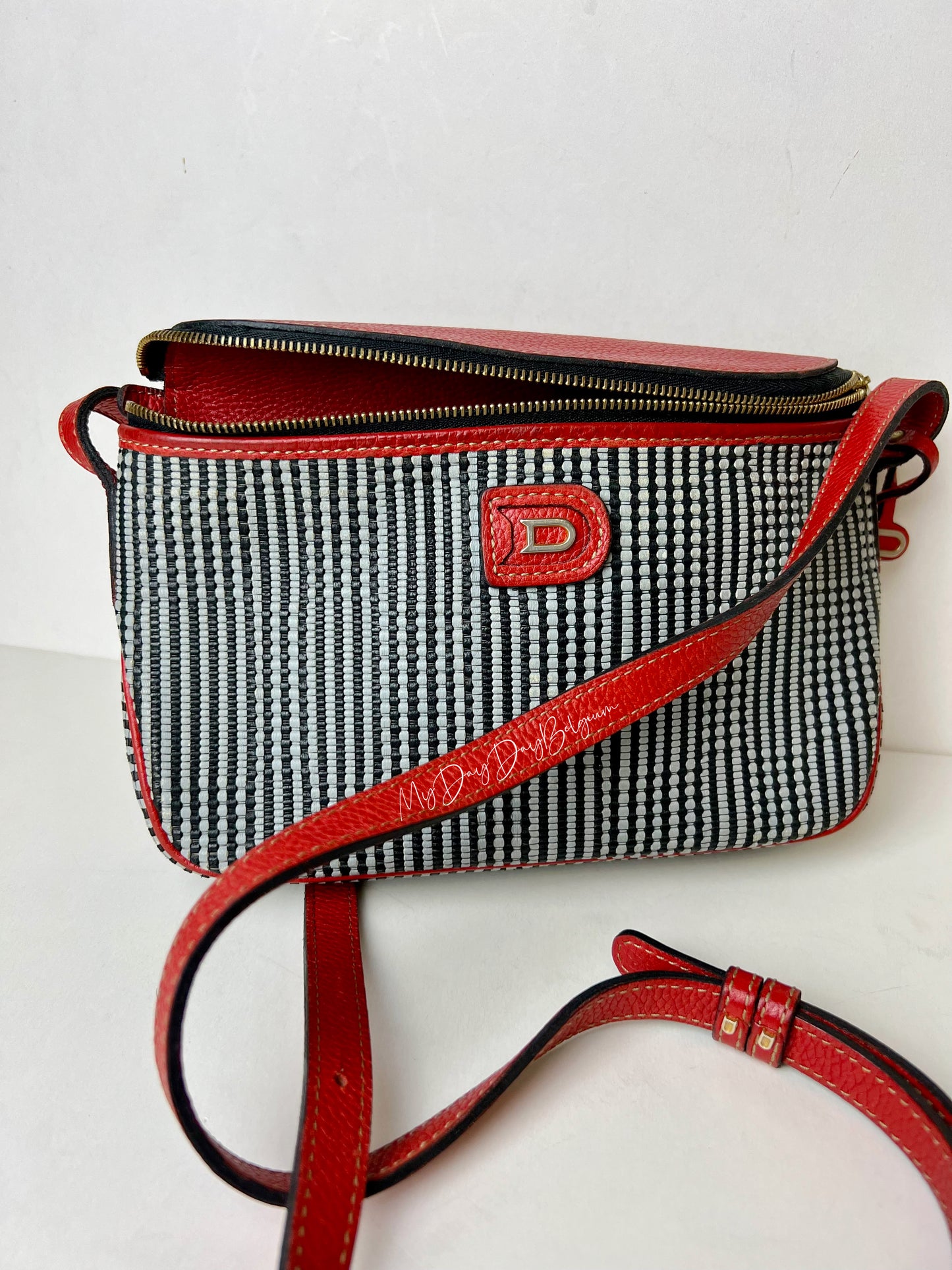 Delvaux Macao in toile de Cuir