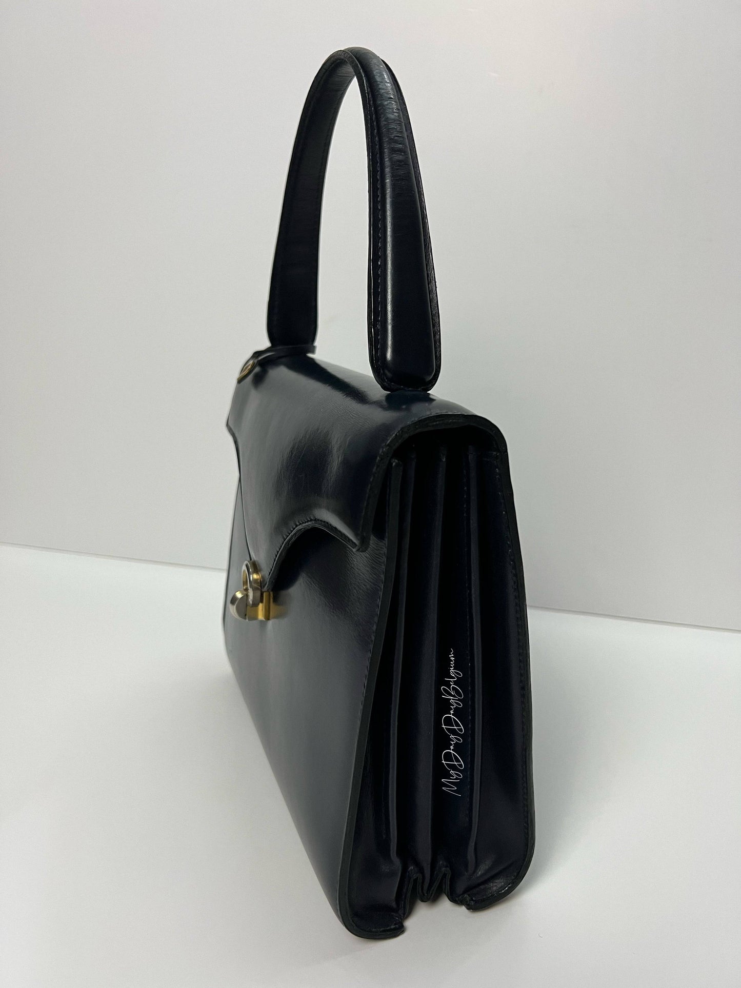 Delvaux vintage 1969 in blue marine