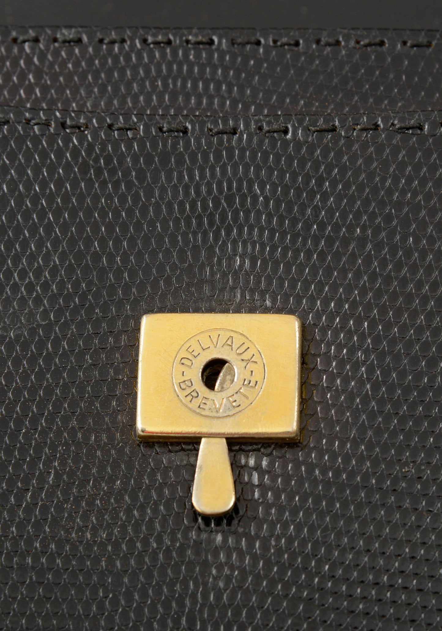 Delvaux vintage top handle handbag in lizard leather 1974