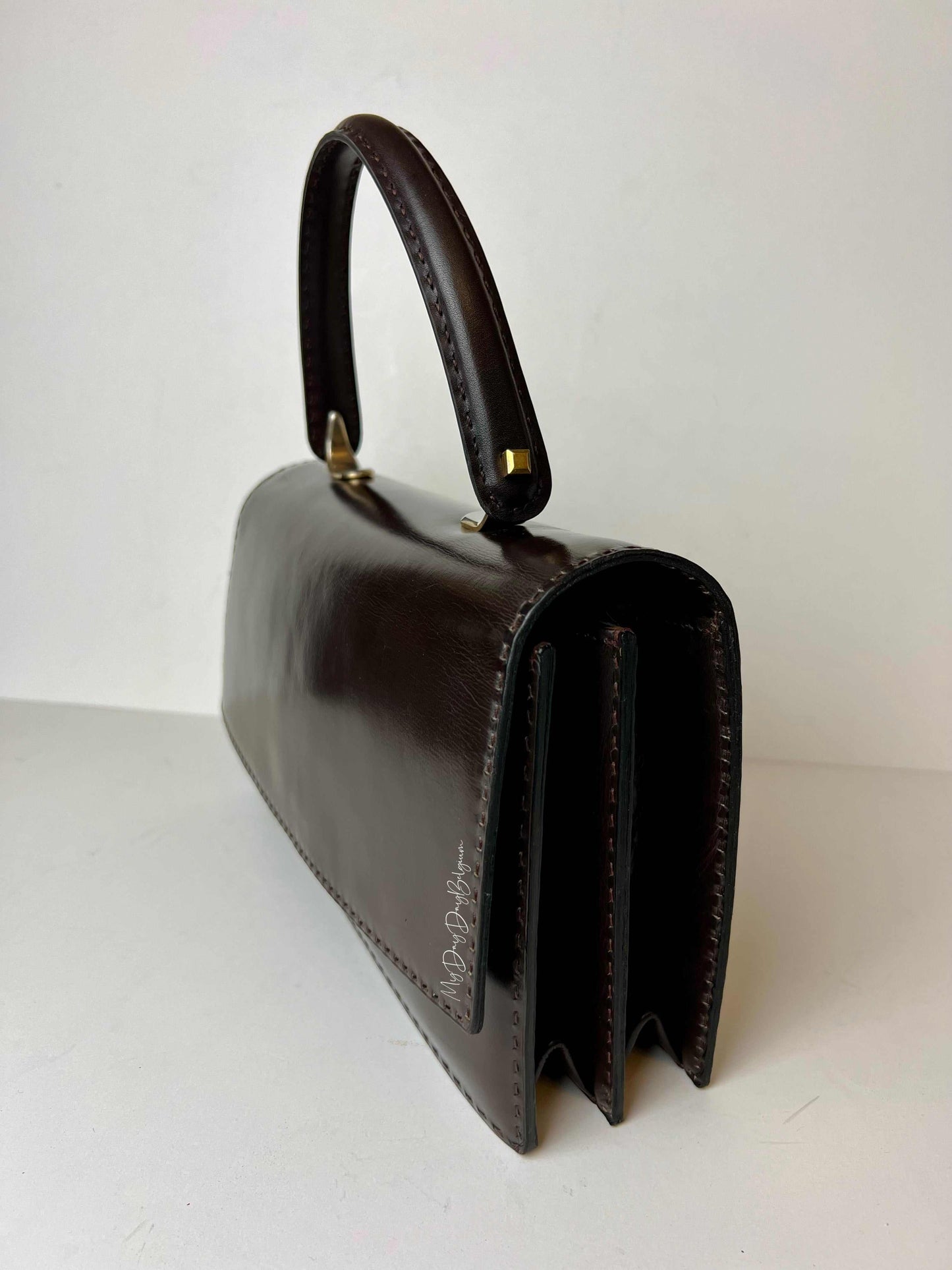 Delvaux vintage top handle handbag 1970