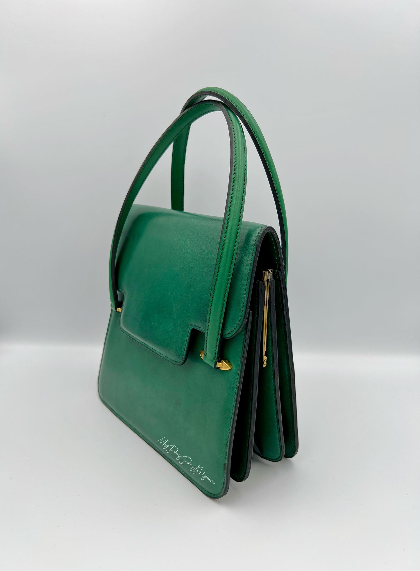 Delvaux vintage top handle green 1966