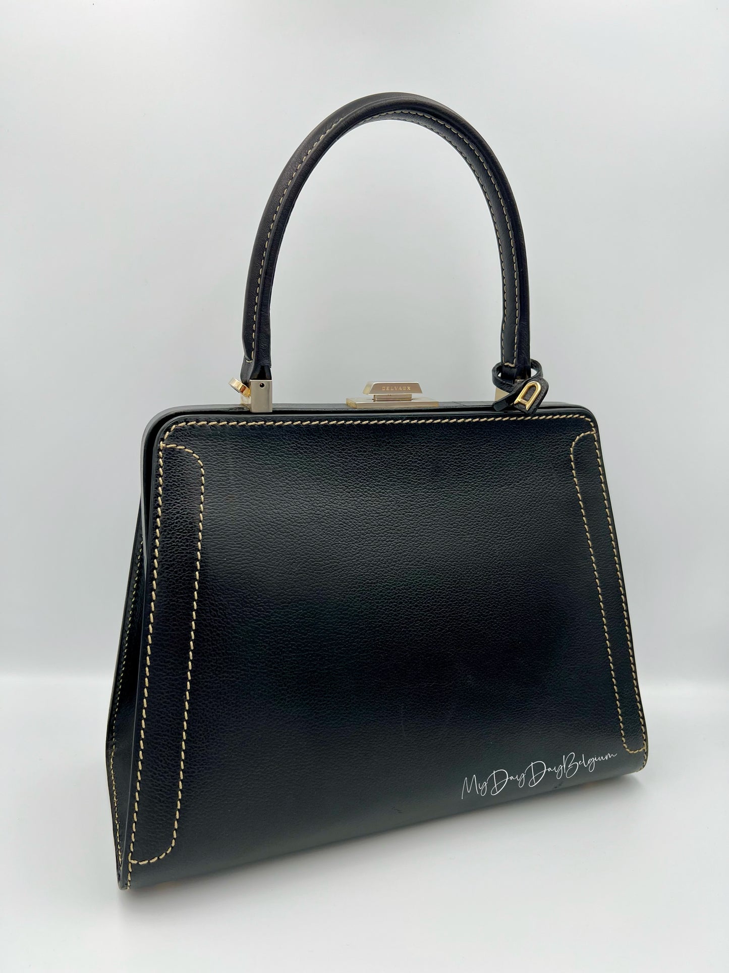 Vintage Delvaux Classico black surpiqué top handle 1999