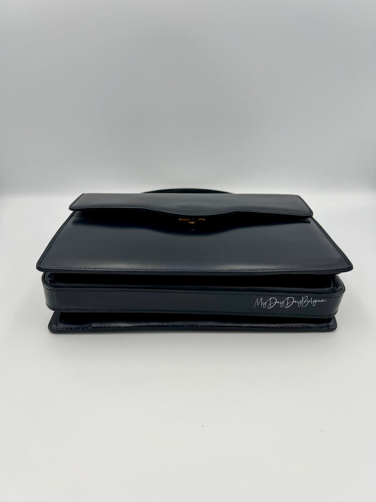 Vintage Delvaux top handle box calf 1967 navy