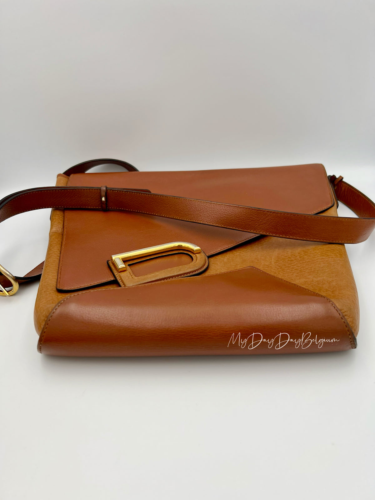 Delvaux vintage crossbody in cognac trotteur leather 1980’s