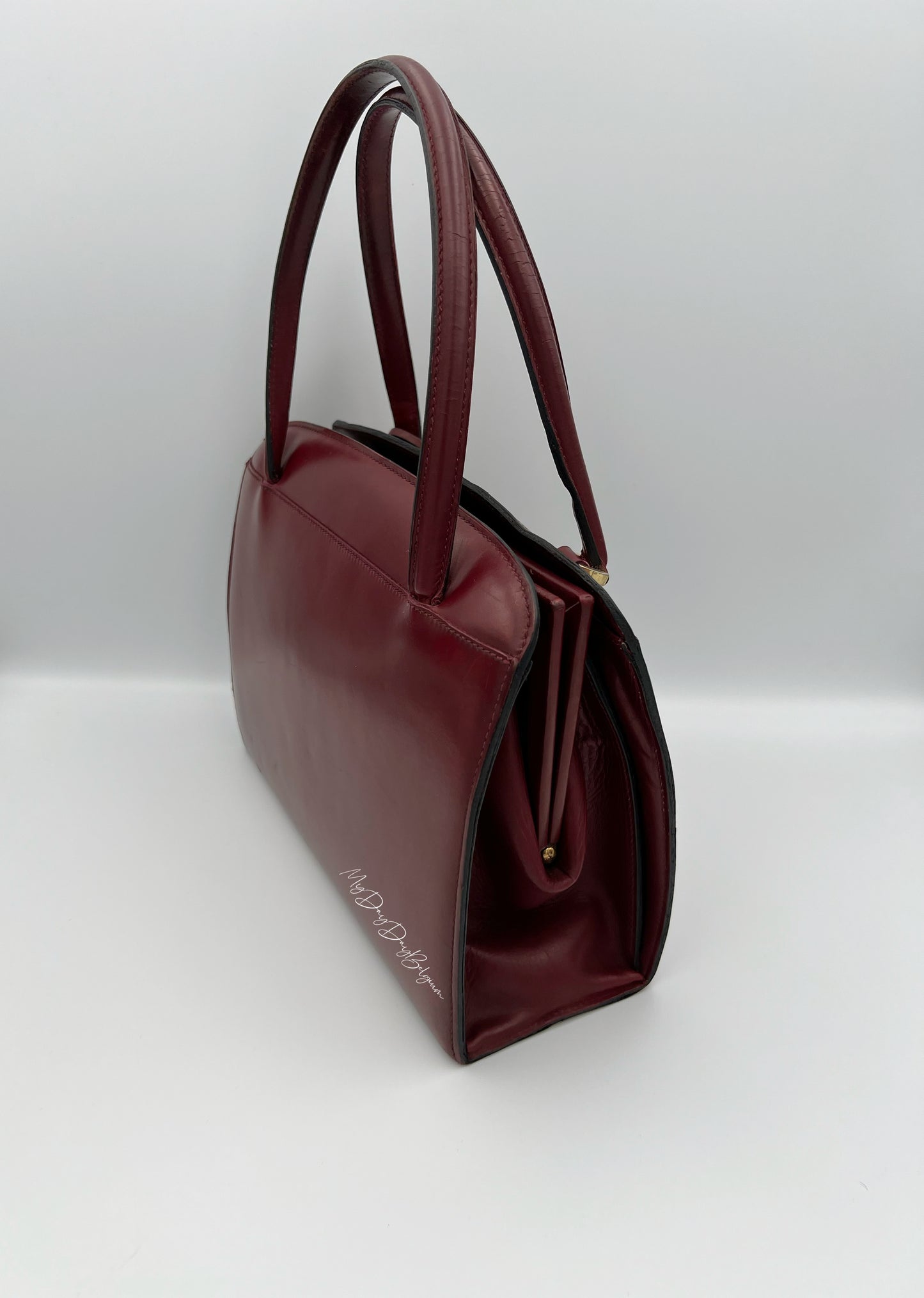 Delvaux Vintage Top Handle Bag burgundy box calf 1967