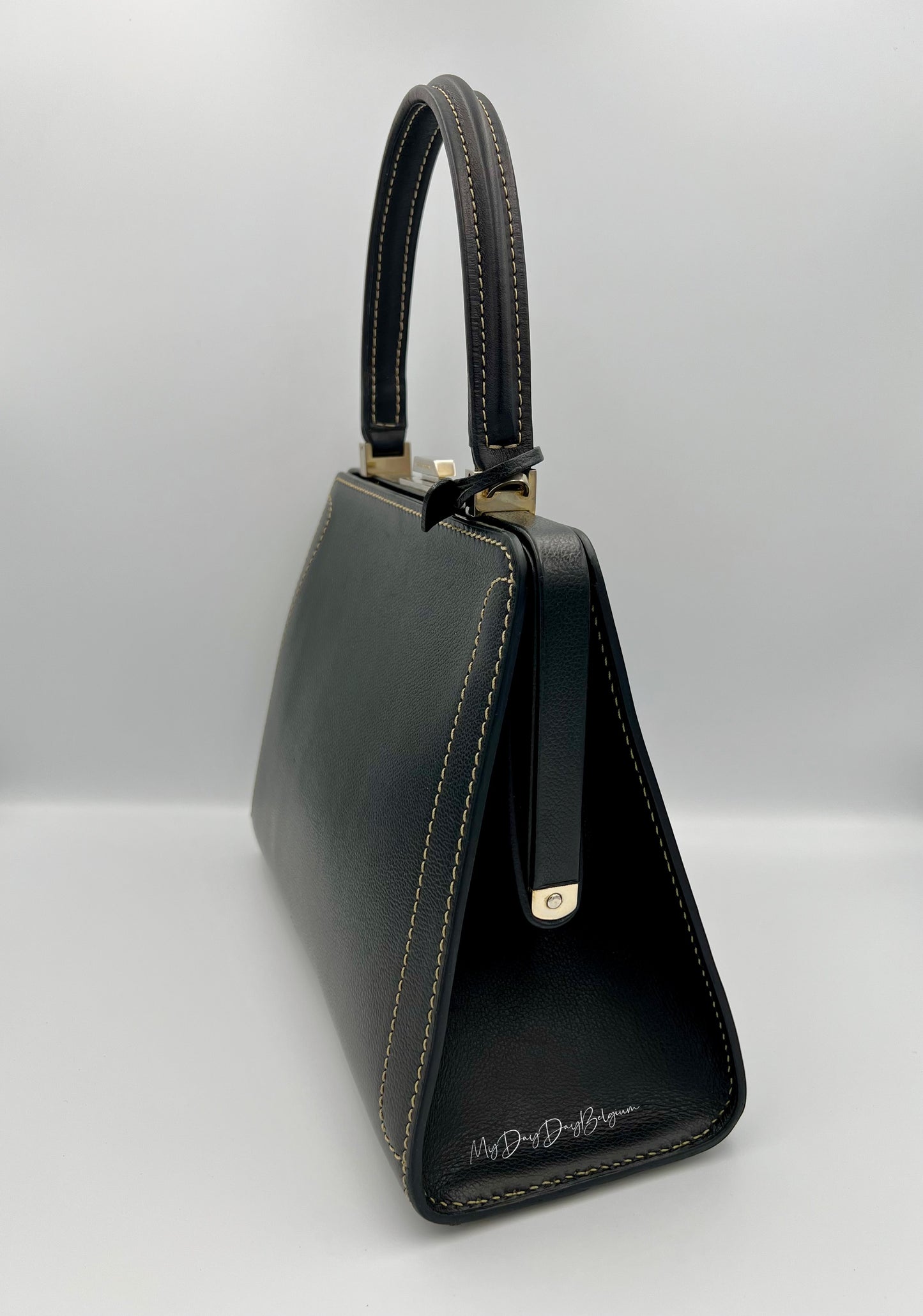 Vintage Delvaux Classico black surpiqué top handle 1999
