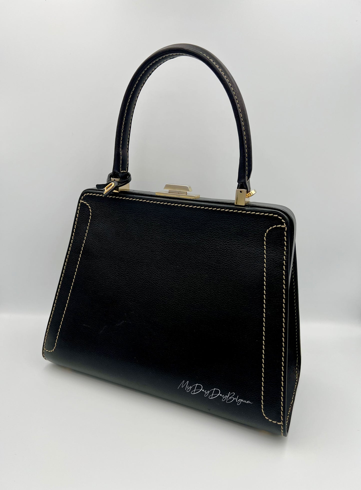 Vintage Delvaux Classico black surpiqué top handle 1999