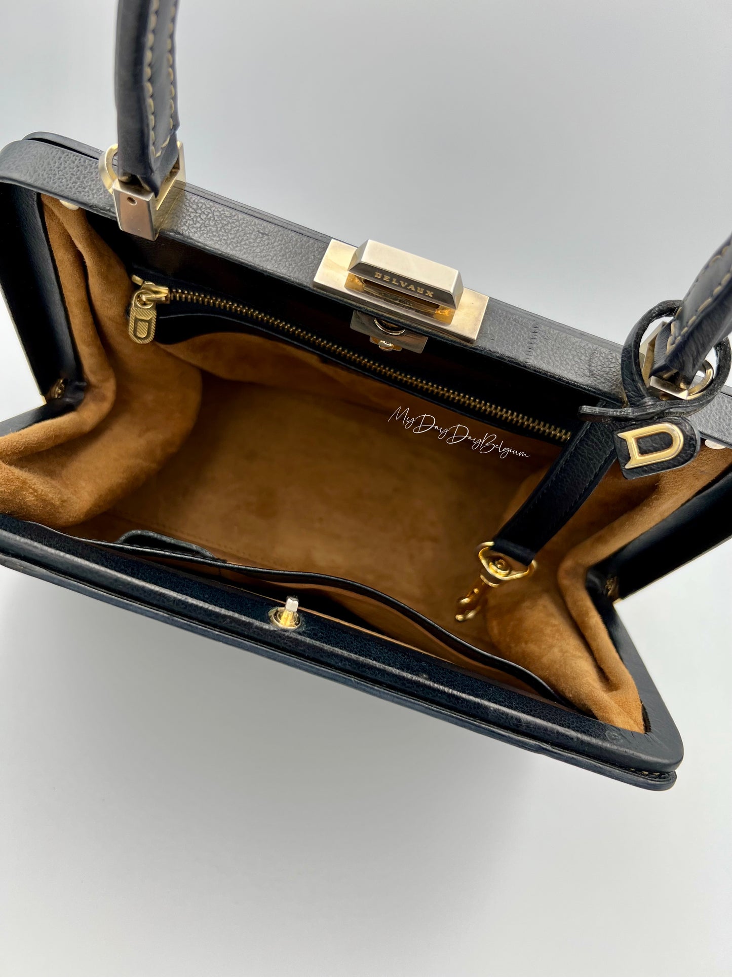 Vintage Delvaux Classico black surpiqué top handle 1999