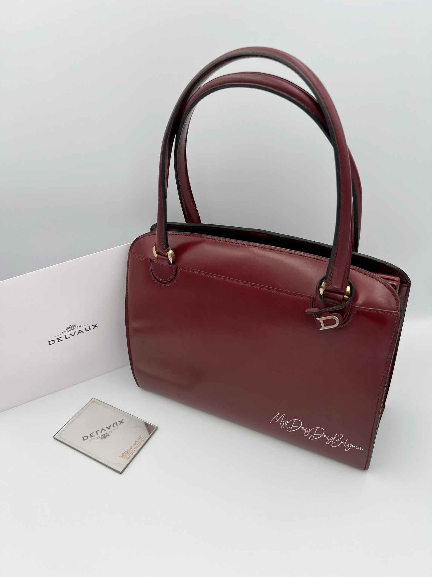 Delvaux Vintage Top Handle Bag burgundy box calf 1967