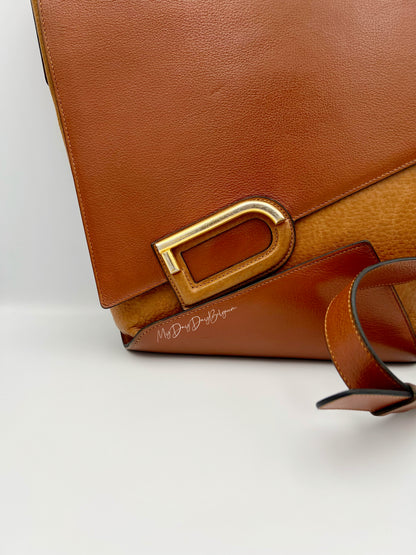 Delvaux vintage crossbody in cognac trotteur leather 1980’s