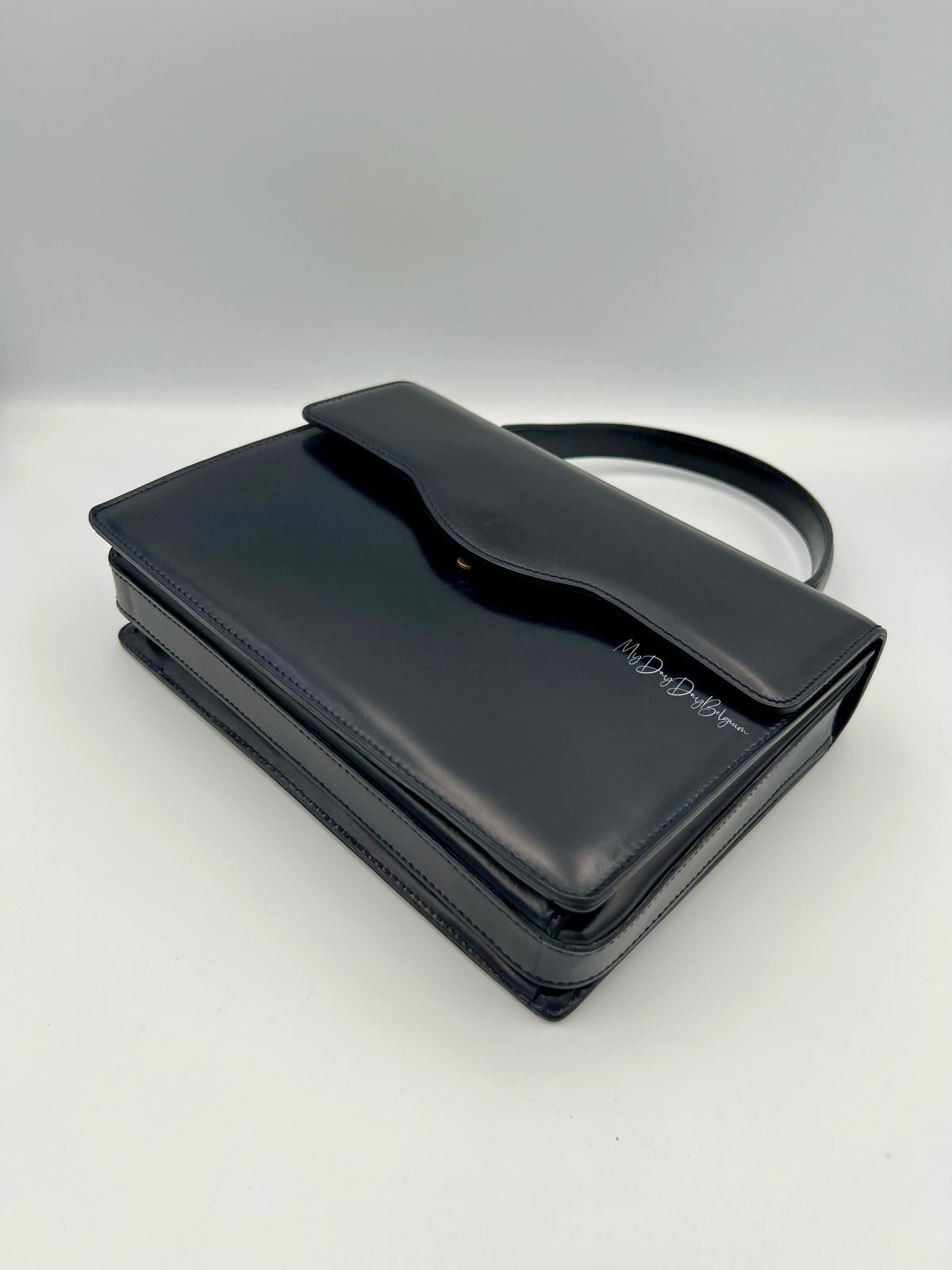 Vintage Delvaux top handle box calf 1967 navy