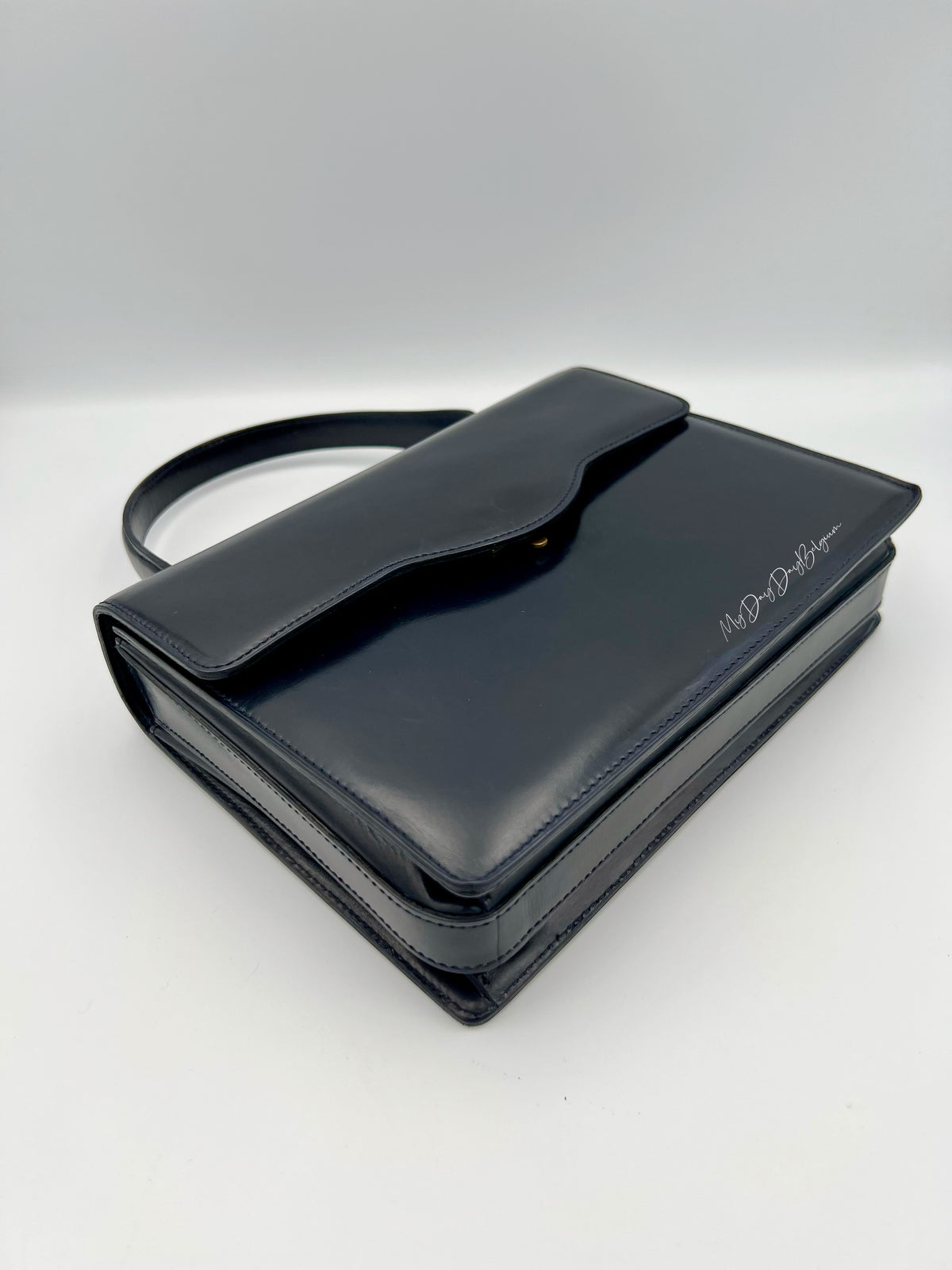 Vintage Delvaux top handle box calf 1967 navy