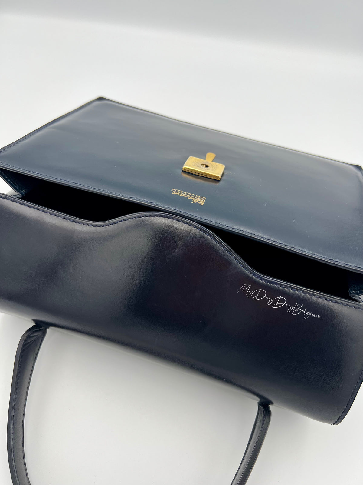 Vintage Delvaux top handle box calf 1967 navy