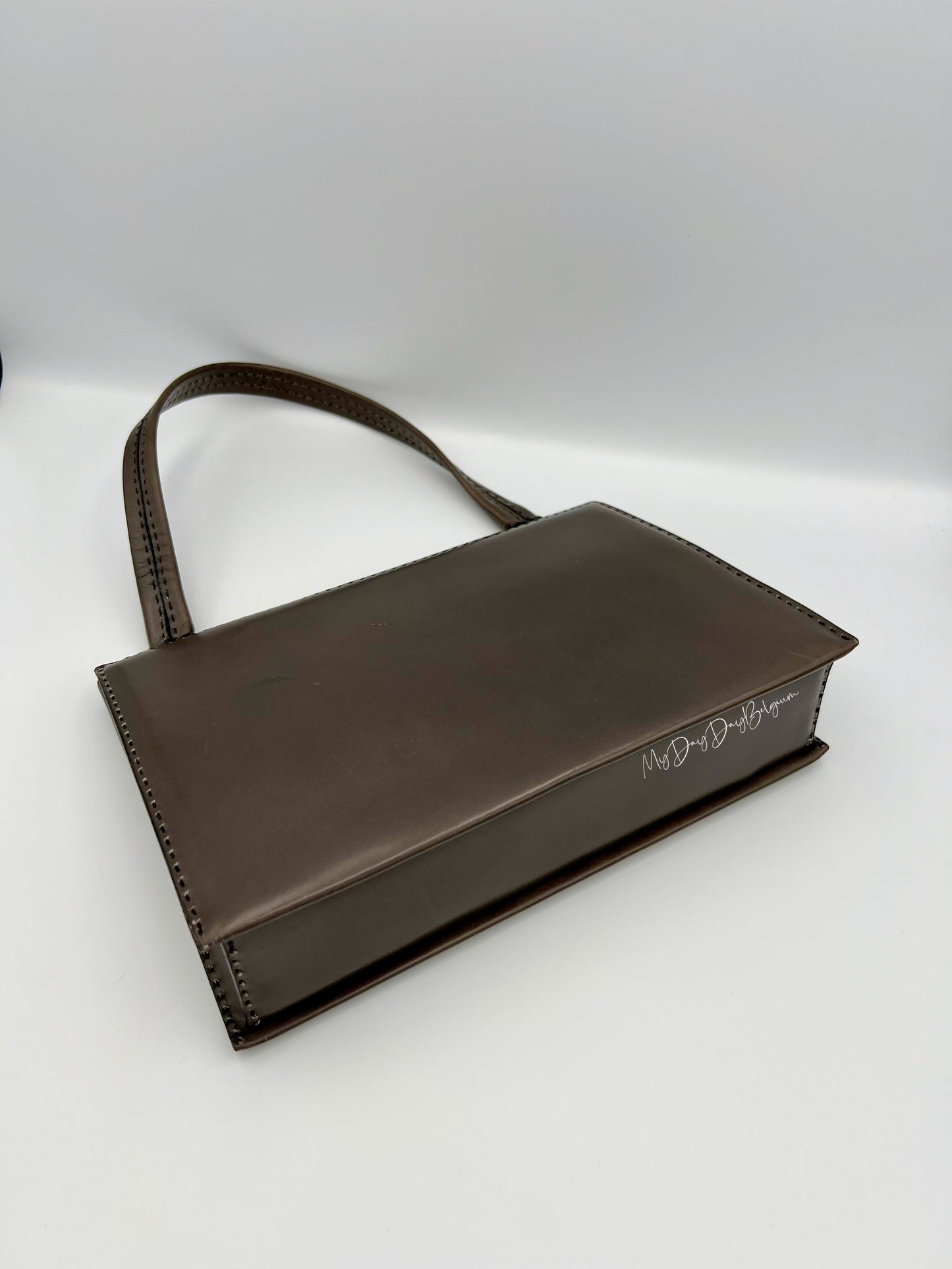 Vintage Delvaux top handle 1969 grey