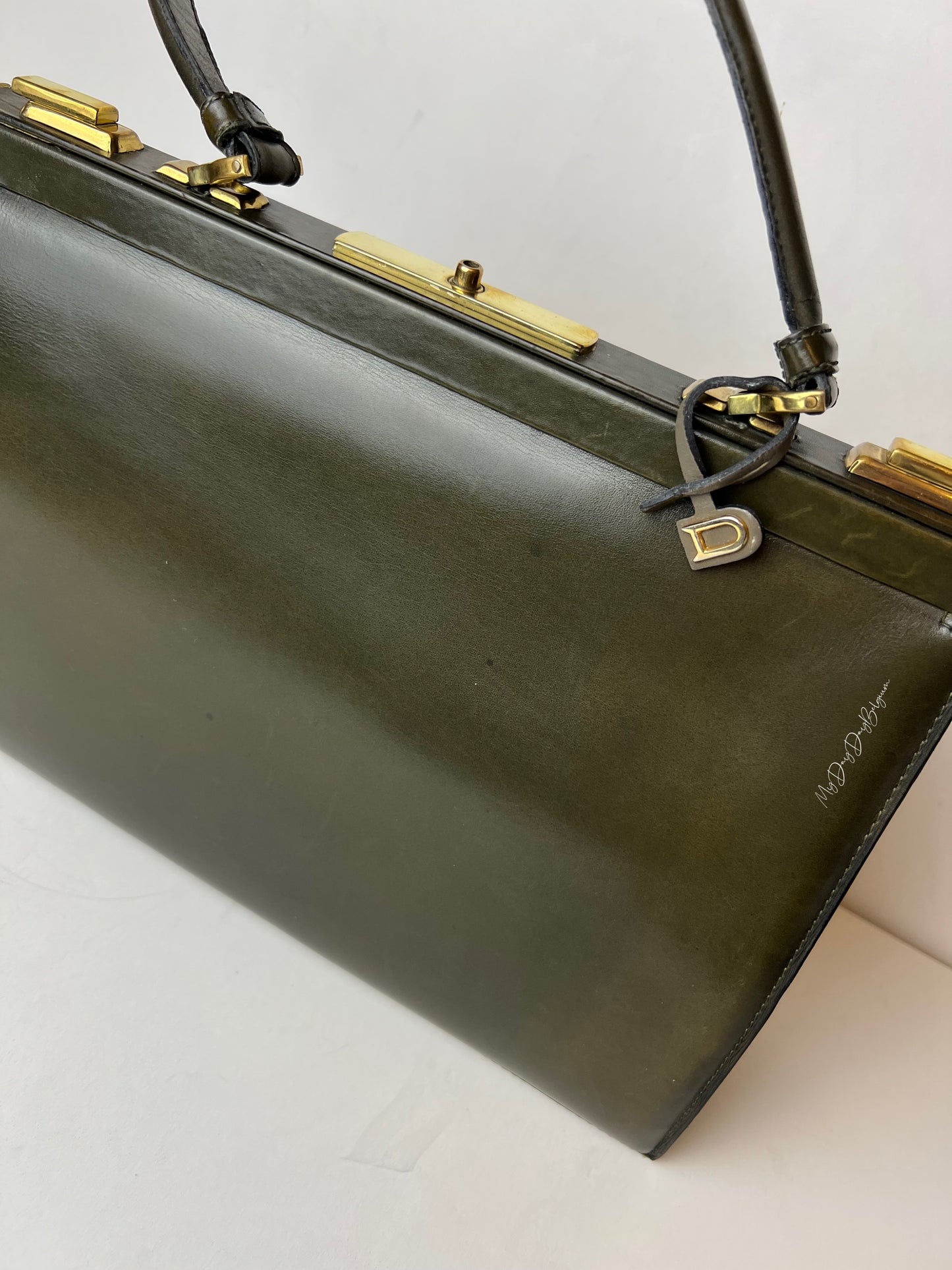 Delvaux Mon Grand Bonheur 1959 bronze green