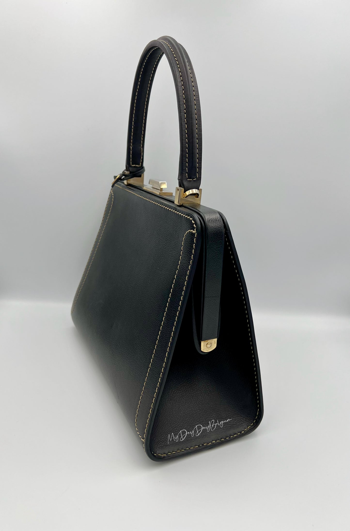 Vintage Delvaux Classico black surpiqué top handle 1999