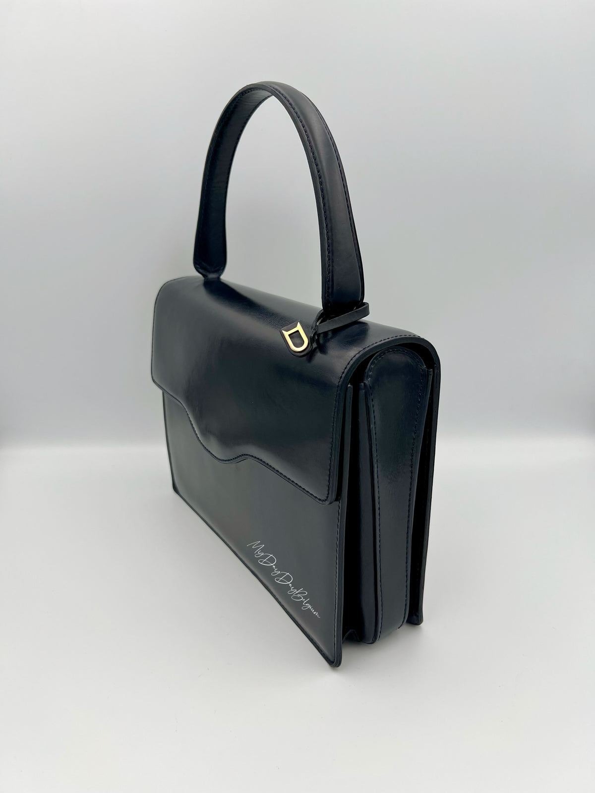Vintage Delvaux top handle box calf 1967 navy