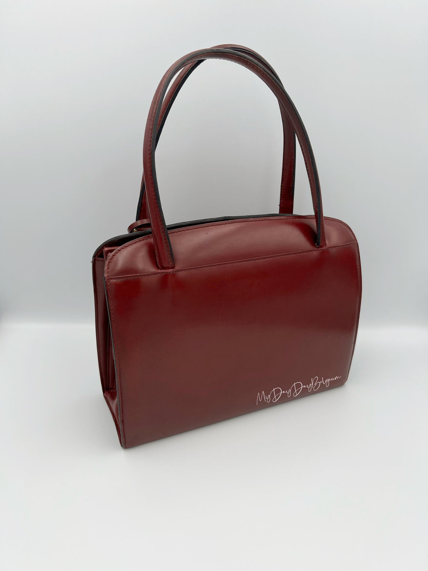 Delvaux Vintage Top Handle Bag burgundy box calf 1967