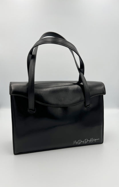 Delvaux vintage top handle 1957
