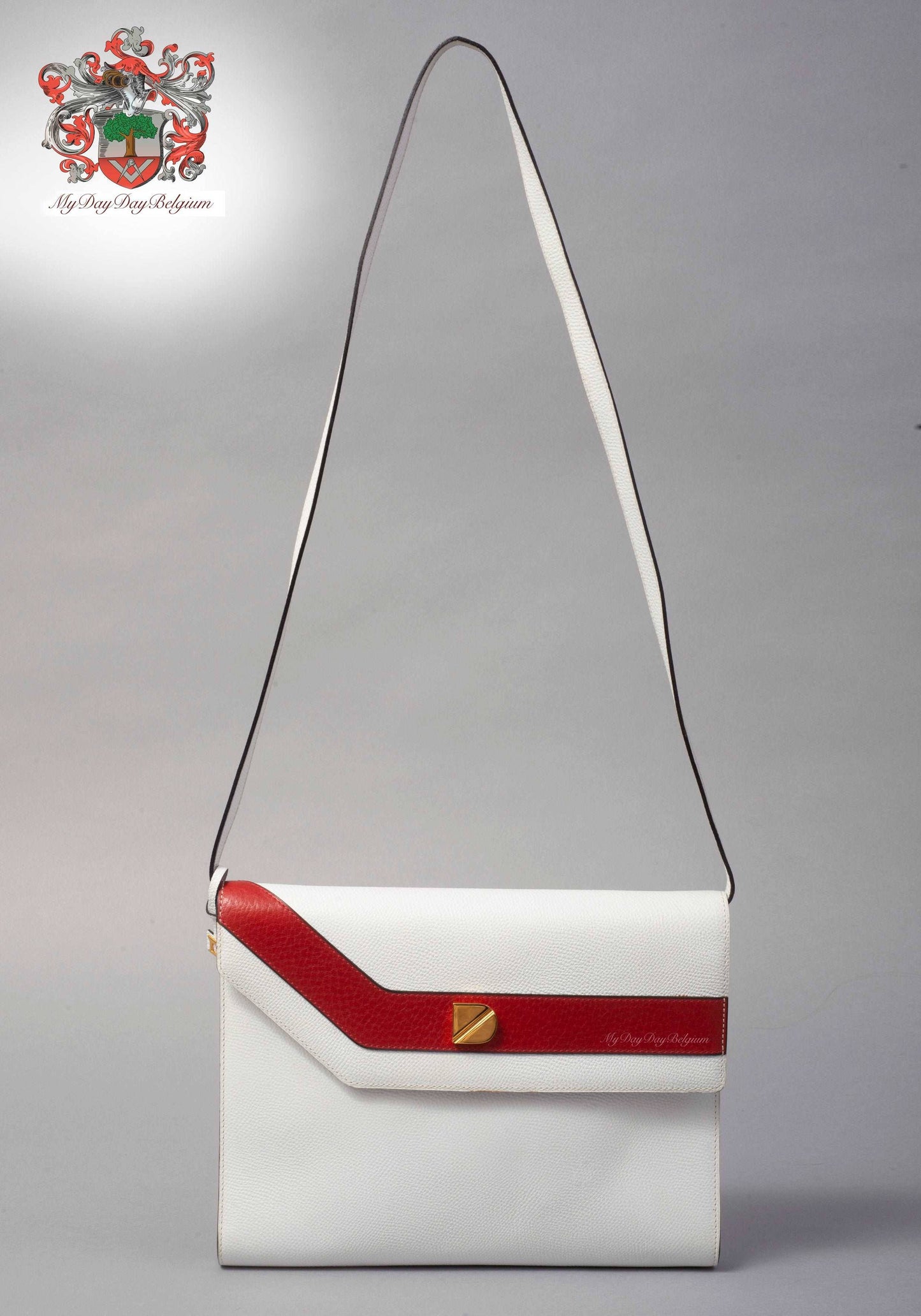 Delvaux vintage crossbody bag in white leather 1984