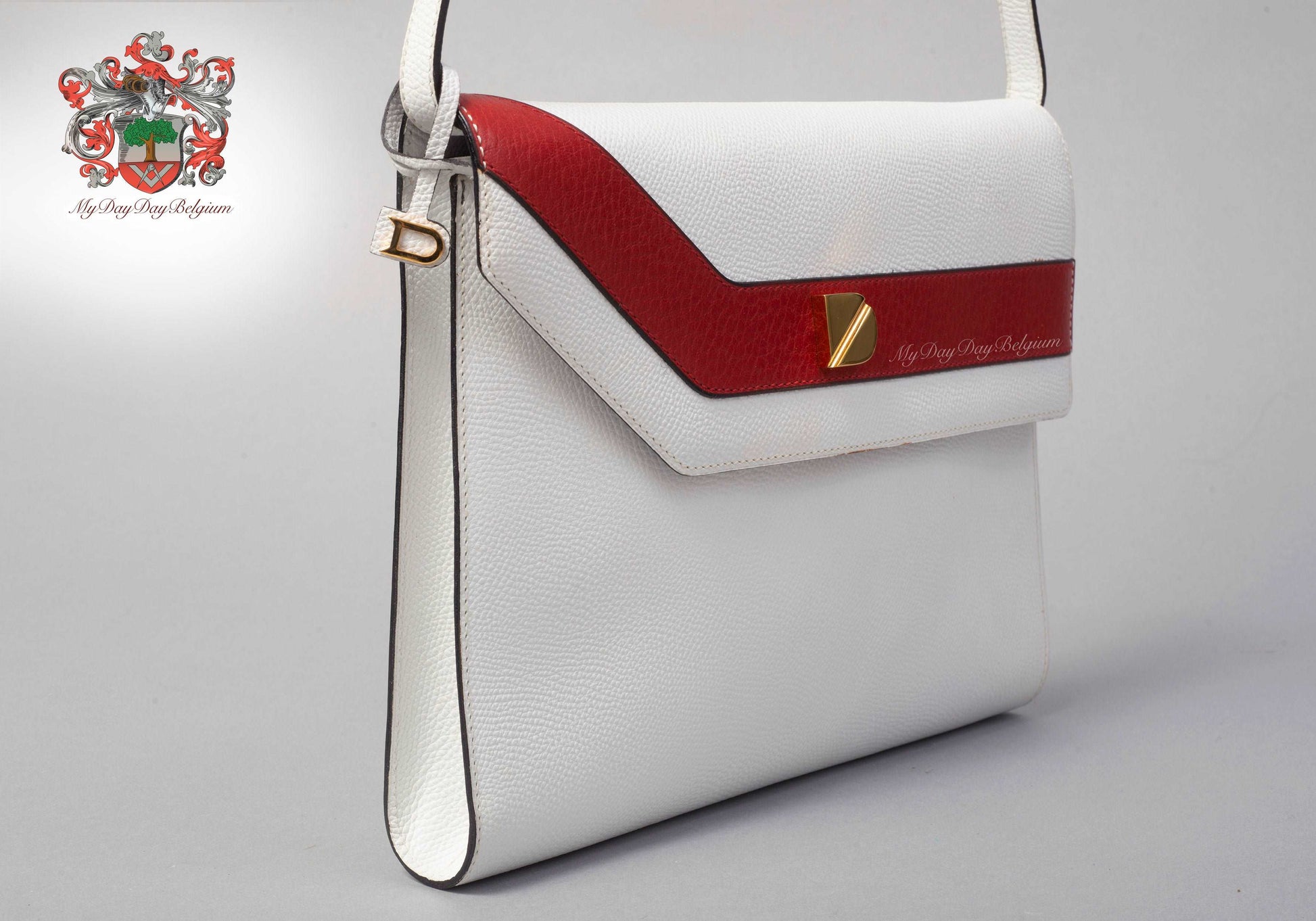 Delvaux vintage crossbody bag in white leather 1984