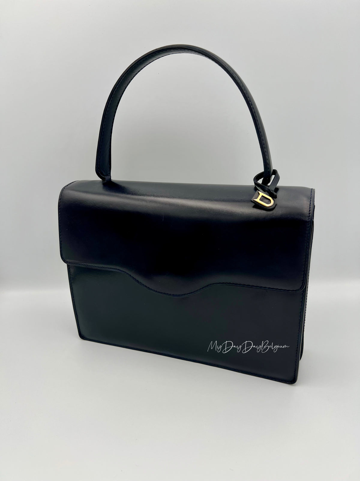 Vintage Delvaux top handle box calf 1967 navy