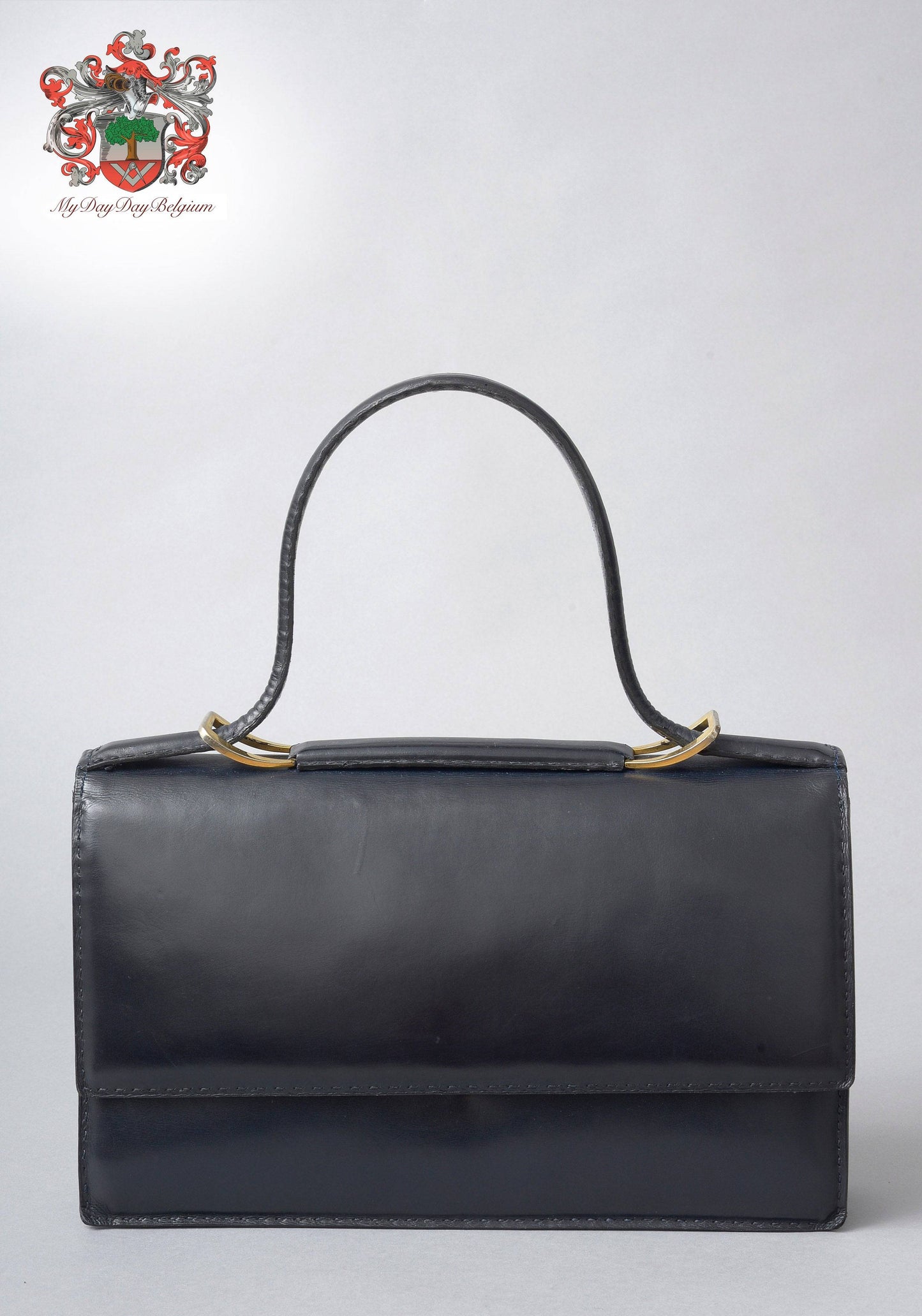 Delvaux vintage top handle handbag 1958