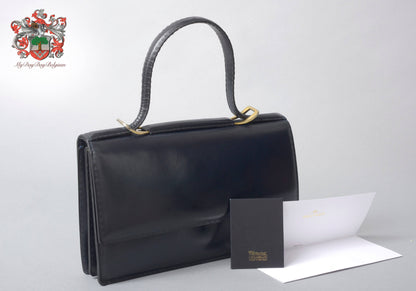 Delvaux vintage top handle handbag 1958